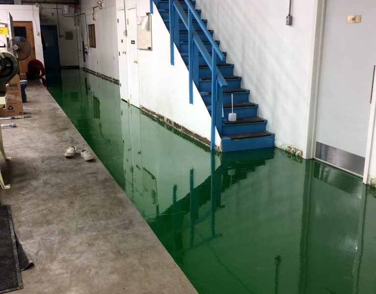 Full broadcast epoxy flooring at B&B Machine