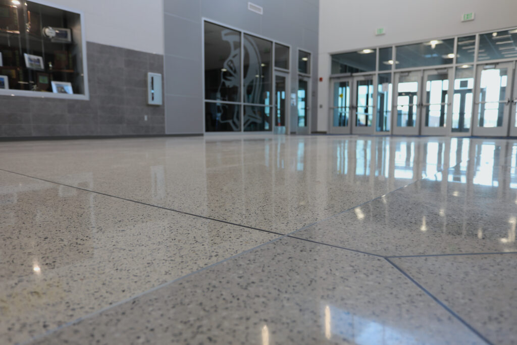Zinc Divider Strip Separating Two Colors of Epoxy Terrazzo