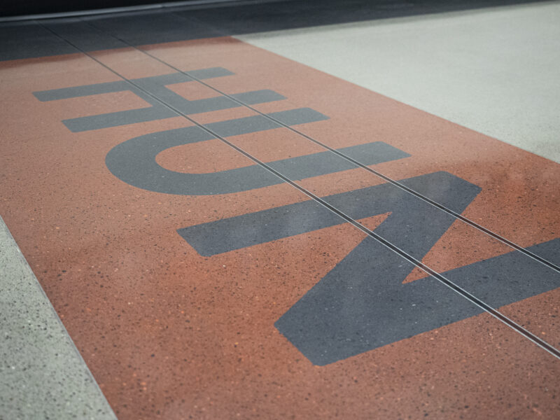 DANCER Polished Concrete with Dyed Logos at Huntington North High School